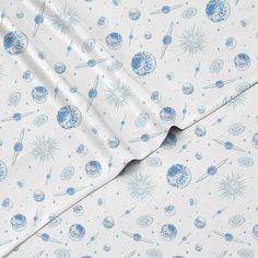 a blue and white space themed sheet set