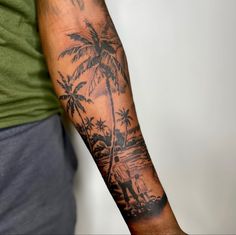 a man with a palm tree tattoo on his arm