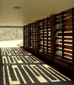 shadows cast on the side of a building