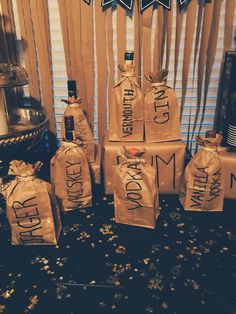 there are many bottles that have been wrapped in brown paper