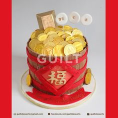 a cake made to look like a basket full of gold coins with chinese writing on top