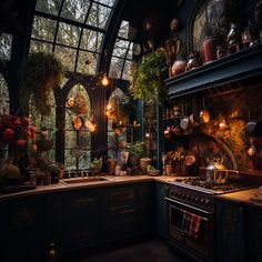 a kitchen filled with lots of pots and pans on top of a stove top oven