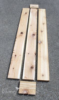 two pieces of wood laying on the ground