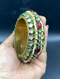 Old ancient enamel kundan bangle with natural ruby Kundan Bracelets For Festivals And Gifts, Red Meenakari Jewelry For Rituals, Unique Jeweled Bangle Jewelry, Wedding Enamel Bangle Jewelry, Fusion Style Ceremonial Bangle Bracelets, Fusion Style Jeweled Bracelet, Fusion Style Jeweled Bracelet Jewelry, Traditional Kundan Bracelets As Gift, Handmade Chandbali Jewelry For Puja