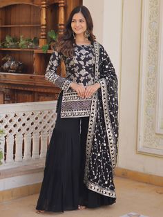 Elevate your ethnic wardrobe with our stunning black Jacquard suit, adorned with exquisite sequin work and zari embroidery. This opulent ensemble exudes sophistication and glamour, making it the perfect attire for a variety of occasions, including receptions, weddings, festivals, and functions. The intricate detailing adds a touch of elegance to the ensemble, making it a standout choice for those who appreciate fine craftsmanship and attention to detail.
Paired with a matching georgette material Black Sharara Suit, Black Sharara, Black Salwar Kameez, Suits For Women Indian, Georgette Material, Readymade Salwar Kameez, Latest Salwar Kameez, Zari Embroidery, Sharara Suit