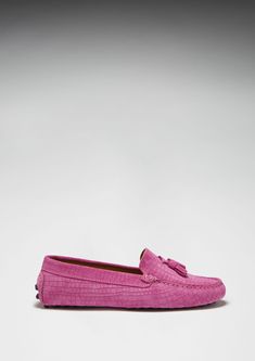 Hugs & Co. pink tasselled loafer driving shoes for women. Moccasin style driving loafers in luxurious pink suede upper embossed with a Gecko print pattern and lined with a soft leather for extra comfort. Made in Portugal 100% Suede Upper featuring a 100% Leather Lining Rubber studded sole