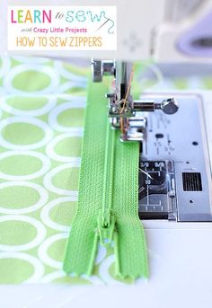 the sewing machine is working on the green fabric