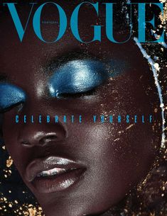 a woman with blue eyeshades and gold glitter on her face is featured in the cover of a magazine