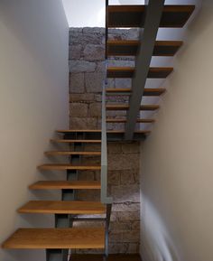 the stairs are made of wood and steel