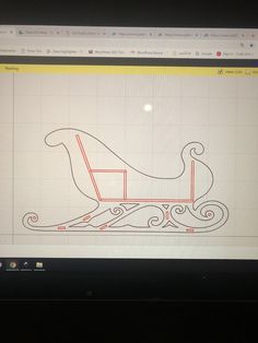 a computer screen with a drawing of a sleigh on it's side