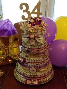 a birthday cake made out of stacks of money