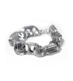 a silver chain bracelet on a white background