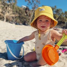 "This yellow bucket hat is the perfect thing for babies toddlers and kids on sunny summer days! Washable linen and cotton fabirc makes it an easy go to for at the park, the beach, or even the backyard! This hat will protect delicate skin from the sun and will quickly become a favorite accessory! See link below for Mommy version. I made this sun hat from a bold yellow colored linen/cotton blend fabric. The strap closes with snaps under the chin keeps them from pulling it off. Brim measures approx Playful Sun Hat With Curved Brim For Playtime, Playful Wide Brim Bucket Hat For Playtime, Playful Curved Brim Sun Hat For Playtime, Playful Wide Brim Sun Hat For Playtime, Playful Bucket Hat With Curved Brim For Playtime, Summer Cotton Hat For Play, Playful Bucket Hat For Playtime, Playful Bucket Hat With Curved Brim, Cute Summer Sun Hat For Playtime