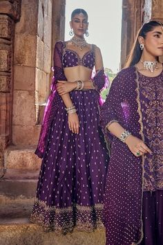 Purple attached cancan scallop hem lehenga with all over florin bahar embroidery using dabka, pearl, gota and zari embellishments. Paired with a strap sleeves matching embroidered padded blouse and an embroidered scallop border handblock printed dupatta. - Aza Fashions Purple Palazzo Set With Pallu For Wedding, Purple Wedding Palazzo Set With Pallu, Bollywood Wedding Palazzo Set With Motifs, Wedding Navratri Purple Palazzo Set, Wedding Palazzo Set With Motifs, Festive Wedding Palazzo Set With Motifs, Fitted Lehenga With Motifs, Designer Purple Lehenga With Motifs, Fitted Sharara With Motifs For Reception