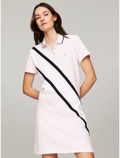 Tommy Hilfiger women's dress. It's everything you love about our polos—styled as a dress and made from soft, comfortable stretch cotton.  Material: 97% Cotton, 3% Elastane. Elegant Polo Dress For Daywear, Chic Pink Cotton Shirt Dress, Elegant Pink Cotton Shirt Dress, Spring Cotton Collared Polo Dress, Cotton Collared Polo Dress For Spring, Classic Cotton Midi Dress, Tommy Hilfiger Pink Spring Dresses, Fitted Collared Cotton Midi Dress, Classic Fitted Cotton Polo Dress