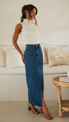 Details: Split trim Denim fabric High waisted skirt SIZE(IN) Waist Length S 24.4 41.3 M 26.0 41.7 L 27.6 42.1 XL 29.1 42.5 Mura Boutique, International Clothing, Denim Midi Skirt, Midi Skirts, Midi Maxi Dress, Romper Pants, Clothing Size Chart, New Arrival Dress, Denim Fabric