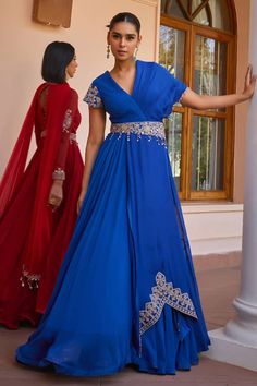 Blue layered anarkali with tilla, dori, pearl, handmade tassels, brass sequins and beaded embroidered sleeves. Comes with a dupatta and a belt. - Aza Fashions Bollywood Dress With Cape Sleeves For Festivals, Bollywood Designer Dress With Cape Sleeves, Designer Navratri Dress With Cape Sleeves, Elegant Anarkali Set With Resham Embroidery And Cape Sleeves, Designer Dress With Cape Sleeves For Navratri, Georgette Dresses With Cape Sleeves For Festivals, Elegant Anarkali Set With Cape Sleeves For Festivals, Designer Festive Dress With Cape Sleeves, Festive Designer Dress With Cape Sleeves