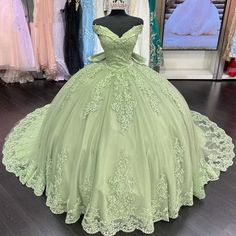 Quinceanera Dresses | KissProm Sage Green Quinceanera Dresses, Sage Green Quinceanera, Green Quince Dress, Dresses With Bow, Green Quinceanera, Green Quinceanera Dresses, Quinceanera Themes Dresses, Off Shoulder Ball Gown, Sweet 15 Dresses