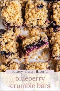 blueberry crumble bars are cut into squares and stacked on top of each other