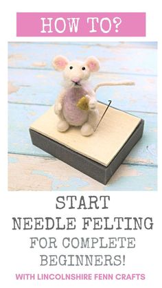 a mouse sitting on top of a wooden block with the words how to start needle felting for complete beginners