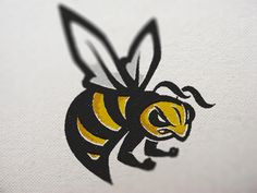 a bee logo is shown on the side of a piece of paper that has been printed onto it