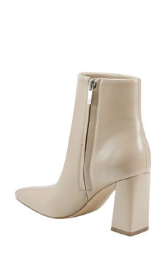 Boasting a clean-lined, sleek silhouette with a modern square toe and tapered block heel, this versatile leather bootie is a go-to cool-weather look. 3 1/2" heel(size 8.5) 4 3/4" shaft Leather upper/synthetic lining and sole Imported Modern Heeled Boots With Padded Block Heel, Modern Block Heel Boots With Padded Heel, Modern Boots With Block Heel And Reinforced Heel, Modern Boots With Reinforced Block Heel, Sleek Boots With Branded Heel Counter And Square Toe, Chic Square Toe Boots With Heel Tab, Chic Heeled Boots With Heel Pull Tab For Work, Sleek Square Toe Boots With Branded Heel, Modern Ankle Heeled Boots With Branded Heel Counter