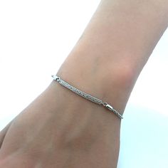 * Designer Ashi 925 Sterling Silver Round Diamond Bar Adjustable Tennis Bracelet * Max Inner Cuff Measures: 9" * Bar Measures: 1-1/4" X 1/8" * Weight: 5.7 Tgw * 12 Round Diamonds Measure Approximately 1 Mm Each * Closure: Slide * Marked: 1/20 * 925 * Ashi * S * Condition: As Pictured. * S6060 Sterling Silver Diamond Cut Chain Bracelet For Anniversary, Everyday Silver Jewelry With Channel Set, Classic Silver Channel Set Diamond Bracelet, Everyday Silver Bracelets With Diamond Cut, Classic Sterling Silver Chain Bracelet With Diamond Accents, Classic Silver Diamond Bracelet For Everyday, Silver Channel Set Diamond Bracelet Fine Jewelry, Silver Channel Set Diamond Bracelet, Formal Silver Chain Bracelet With Pave Setting