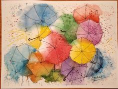 watercolor painting of colorful umbrellas on white paper with brown wood flooring area