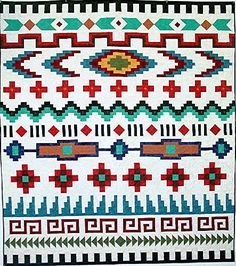 an old native american rug with geometric designs on the front and back side, in red, white, blue, green and orange colors