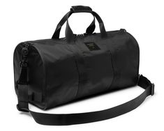 MADE IN USA: Handmade in our Los Angeles HQ, this customizable duffle is a lightweight and outdoor-ready version of our sleek original Duffle. This duffle bag is perfectly sized for a quick getaway, holiday travel, an adventure to the great outdoors, or a trip to the gym.- Premium full-grain leather- Swiss-made Riri zippers in antique finish- Bullhide leather handles and accents- Durable IFAC class 1 fire retardant interior with waterproof black nylon lining and a zippered pocket- Removable and Travel Duffle Bag With Functional Pockets, Functional Travel Duffle Bag With Pockets, Functional Duffle Bag With Adjustable Strap For Weekend Trips, Everyday Waterproof Functional Duffle Bag, Sporty Duffle Bag With Luggage Sleeve For Travel, Sporty Travel Duffle Bag With Functional Pockets, Functional Duffle Bag With Adjustable Strap For Outdoor, Functional Travel Duffle Bag, Functional Waterproof Weekender Bag For Overnight Trips