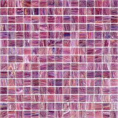 a pink and purple tile wall with small squares on it's sides, all in different colors