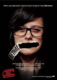 a woman with glasses and a fake moustache on her face, holding a bar of chocolate in front of her mouth