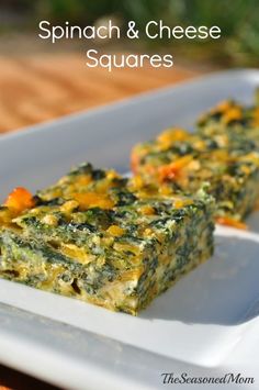 spinach and cheese squares on a plate with text overlay that reads spinach and cheese squares