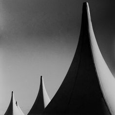 a black and white photo of some tents