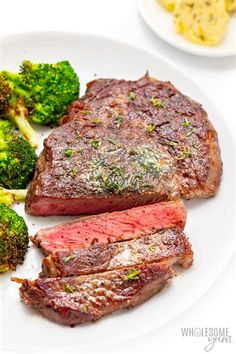 steak, broccoli and mashed potatoes on a white plate