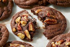 chocolate cookies with walnuts and pecans on top