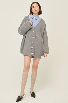 Lucy Boyfriend Cardigan Front button closure Super oversized cardigan Ribbed cuffs and hem * Product Specification 60% Wool 15% Nylon 13% Polyester 12% Acrylic * Flat Measurement: S/M: Shoulder: 80.5cm (31.7in) / Bust: 80.5cm (31.7in) / Sleeve: 50cm (19.7in) / Armhole: 23cm (9.1in) / Length: 79.5cm (31.3in) / M/L: * Professional Clean Only / Do Not Tumble Dry Model's height is 5′ 7″ (176cm) Bust 31in Waist 23in Hip 34in and wearing S/M 사이즈 정보Size information (단위:cm)(Unit : inch) S/MS/M 사이즈 정보 Si Oversized Soft Knit Button-up Outerwear, Oversized Soft Knit Button-up Cardigan, Trendy Oversized Buttoned Cardigan, Trendy Oversized Cardigan With Buttons, Oversized Long Sleeve Sweater Coat With Button Closure, Oversized Cozy Sweater Coat With Button Closure, Trendy Oversized Sweater With Button Closure, Trendy Oversized Cardigan With Button Closure, Oversized Long Sleeve Sweater With Button Closure