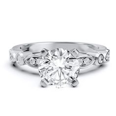 a white gold engagement ring with diamonds on it