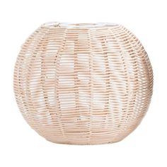 a white vase made out of wicker