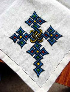 Ethiopian Fabric, African Embroidery Designs, Ethiopian Tribes, Traditional Bedding Sets, Crucifix Art, History Of Ethiopia, Ethiopian Cross