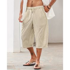 Category:WE-Pants; Season:Summer; Fabric:25% Linen,75% Cotton; Gender:Men's; Style:Hawaiian,Boho; Occasion:Beach,Holiday,Vacation; Fit Type:Regular Fit; Function:Comfort,Breathable; Waistline:Mid Waist; Pattern:Plain; Design:Elastic Waist,Drawstring,Pocket; Pants Type:Summer Shorts,Linen Shorts,Beach Shorts; Fly Type:Elasticity,Drawstring; Front page:FF; Listing Date:04/07/2024; Production mode:External procurement; Hips:; Length:; Waist:; Pants Length:Calf-Length Bottoms With Built-in Shorts For Vacation Leisure, Leisure Bottoms With Pockets For Vacation, Vacation Leisure Bottoms With Pockets, Summer Khaki Bottoms With Built-in Shorts, Khaki Bottoms With Built-in Shorts For Summer, Bermuda Bottoms For Leisure In Summer, Summer Bermuda Leisure Bottoms, Leisure Bermuda Bottoms For Summer, Leisure Shorts With Pockets For Beach Season