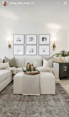 a living room filled with furniture and pictures on the wall above it's coffee table