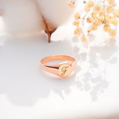 Elevate your ring game (or find the perfect anniversary gift) with our  Personalized Signet Ring. This timeless piece features a smooth, polished  surface waiting to be customized with your initials or a special symbol.  Crafted from your choice of gleaming gold or sleek silver, this dainty signet  ring is perfect for stacking with other favorites or wearing solo for a touch  of classic elegance. Super Features: * Tell Your Story: Personalize it with your initials, a meaningful  symbol, or even Rose Gold Tarnish Resistant Rings For Gift, Rose Gold Tarnish-resistant Rings For Gift, Engraved Rings For Valentine's Day, Customizable Rose Gold Initial Ring For Gift, Rose Gold Signet Ring With Initials For Gift, Rose Gold Engraved Ring With Name For Gift, Rose Gold Engraved Name Ring As Gift, Personalized Rose Gold Signet Promise Ring, Rose Gold Engraved Name Ring For Gift