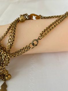 "Etruscan Revival Festoon Necklace and Bracelet Set Gold Tone Ornate Vintage Patina Necklace - 16.5\" plus festoon drop with dangles additional 4\" Length Bracelet - 7.5\" Bracelet medallion 1.76x x 1.50@ No markings Aged patina, can use white vinegar to brighten if preferred" Vintage Festival Jewelry With Adjustable Chain, Antique Adjustable Necklace For Festivals, Antique Adjustable Necklaces For Festivals, Adjustable Antique Necklaces For Festivals, Bohemian Metal Bracelets With Latkans, Metal Bracelets With Latkans For Festival, Bohemian Chain Bracelets For Festivals, Vintage Jewelry With Latkans For Festive Occasions, Vintage Adjustable Necklace For Festivals