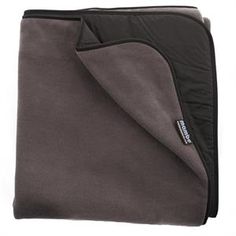 an image of a blanket folded on top of it's side with the cover pulled up