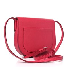 This is an authentic CELINE Grained Calfskin Small Trotteur in Dark Pink. This stylish shoulder bag is crafted of luxuriously grained calfskin in dark pink. The bag features a matching cross-body shoulder strap, silver hardware, and a rear pocket. The facing flap opens to a matching interior with card slots and a zipper pocket. Stylish Shoulder Bag, Silver Hardware, Dark Pink, Cross Body, Card Slots, Calf Skin, Zipper Pocket, Slots, Shoulder Strap