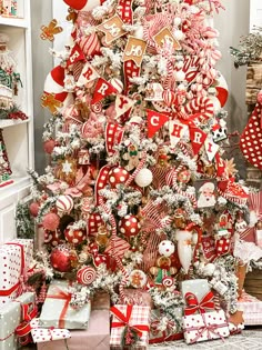 a christmas tree decorated with red and white ornaments