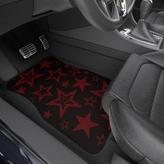 the interior of a car with red stars on it