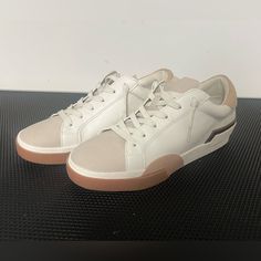 Brand New And Never Worn. Sporty Cream Sneakers With Flat Heel, Sporty Cream Sneakers, Trendy Beige Sneakers With Perforated Toe Box, Trendy Cream Sneakers With Cushioned Footbed, Chic Spring Sneakers With Cushioned Footbed, Trendy Cream Sneakers With Textured Sole, Chic Lace-up Sneakers With Cushioned Footbed, Trendy Cream Synthetic Sneakers, Trendy Cream Sneakers With Perforated Toe Box