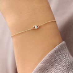 14k Channel Setting Diamond Evil Eye Bracelet – FERKOS FJ Diamond Evil Eye Bracelet, Gold Minimalist Jewelry, Gold Bracelet Simple, Gold Earrings Models, Diamond Evil Eye, Channel Setting, Gold Pendant Jewelry, Classy Jewelry, Eye Bracelet